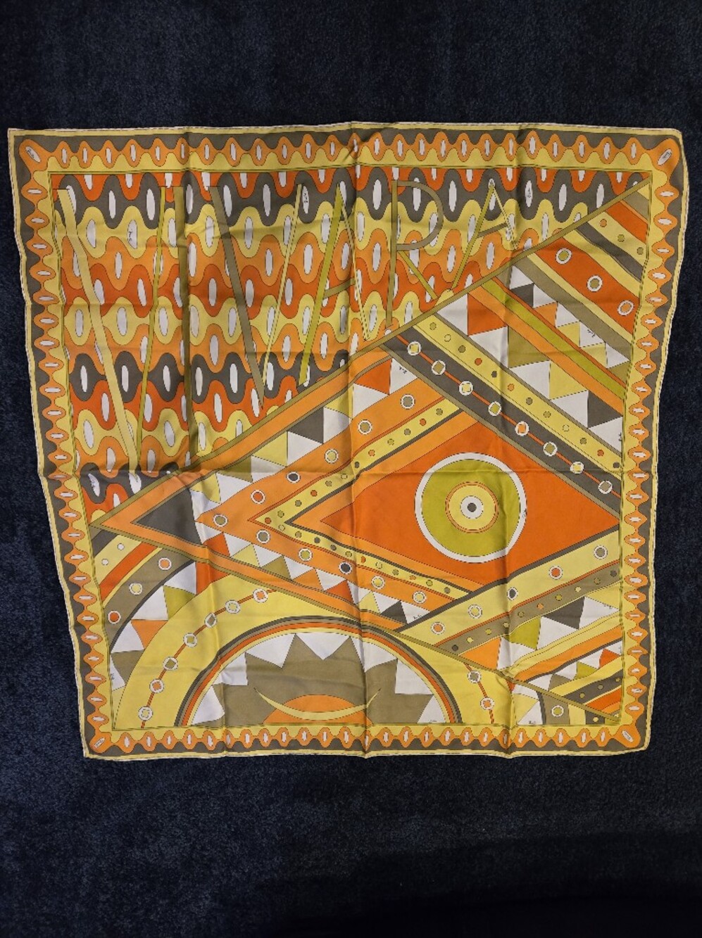 Emilio Pucci silk scarf featuring a vibrant orange and yellow
